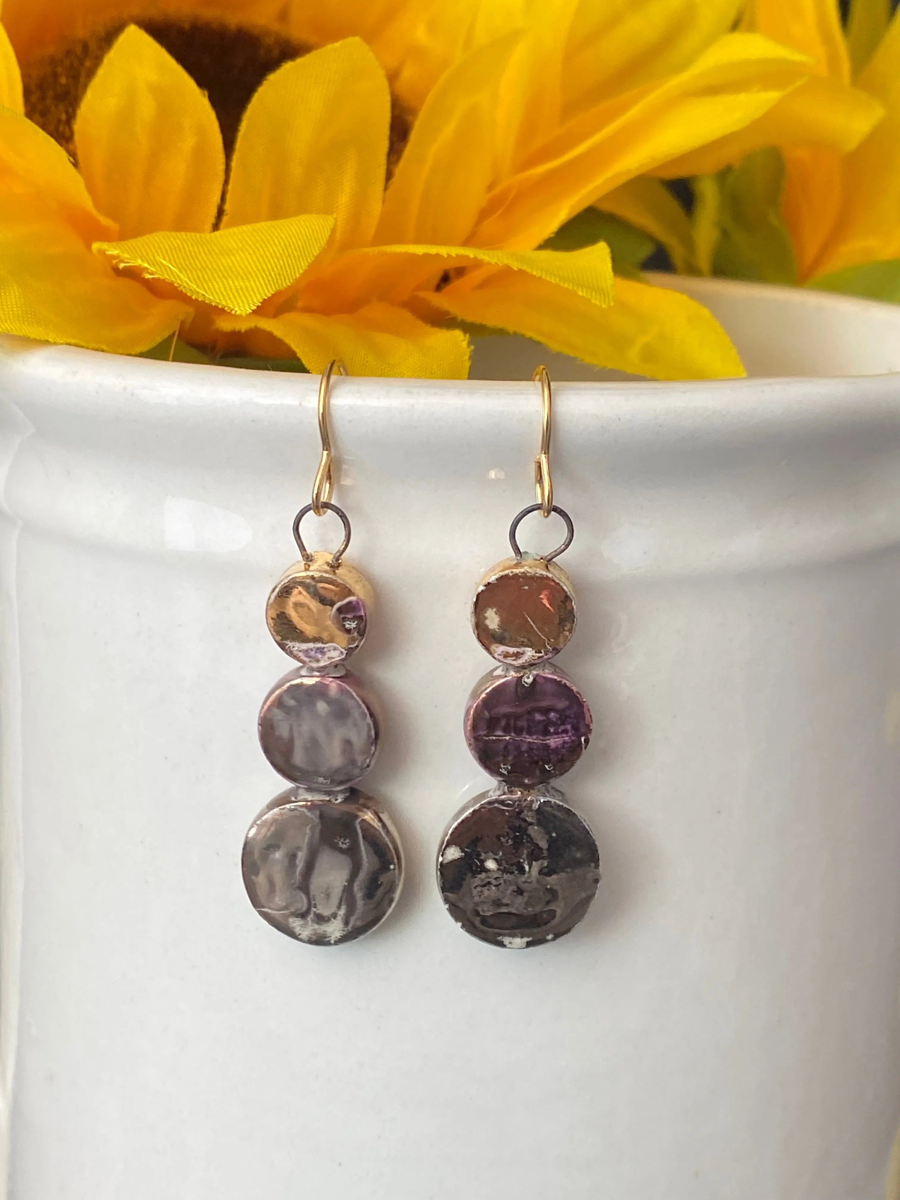 Ceramic charms, gold metal, earrings.